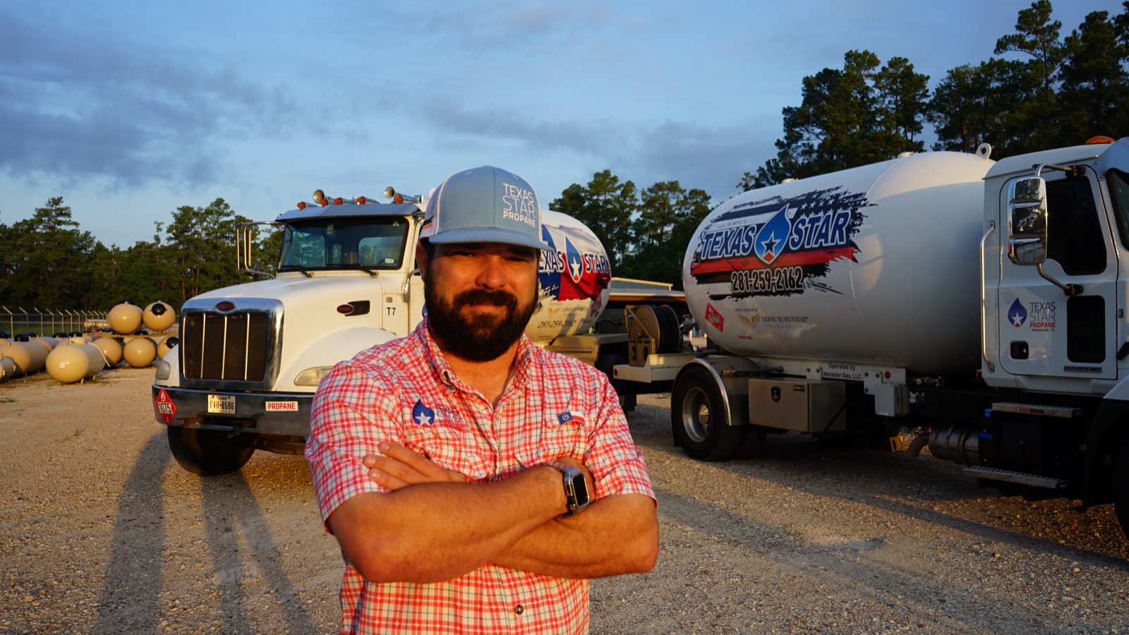 Two branded Texas Star tanker trucks parked together.
