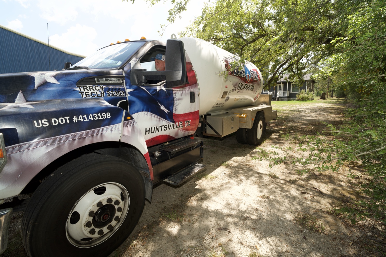 A branded Texas Star truck with its driver and DOT numbers visible.