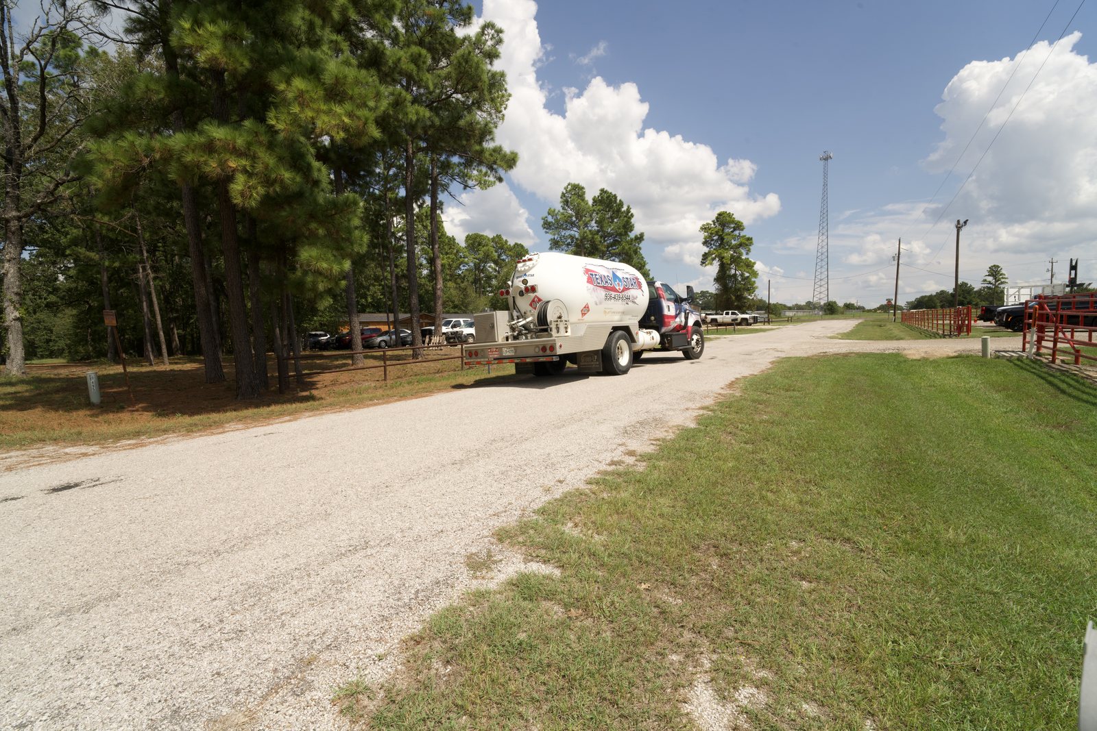 A Texas Star Propane bobtail truck on a gravel road near the Plantersville branch.