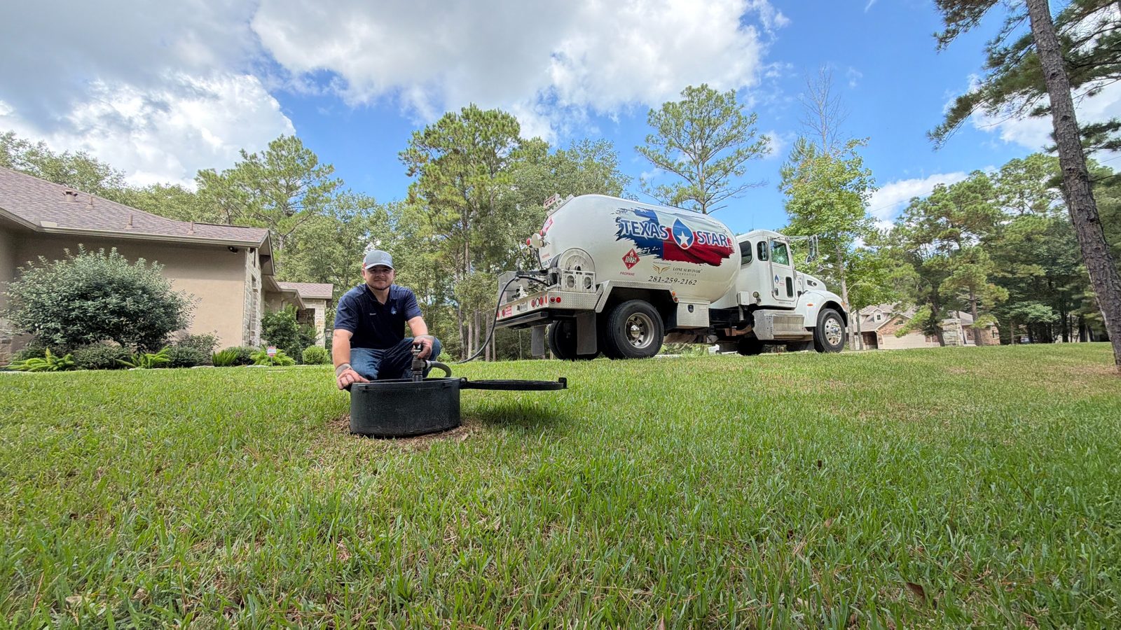 Bryan, TX technician servicing a residential propane tank during delivery
