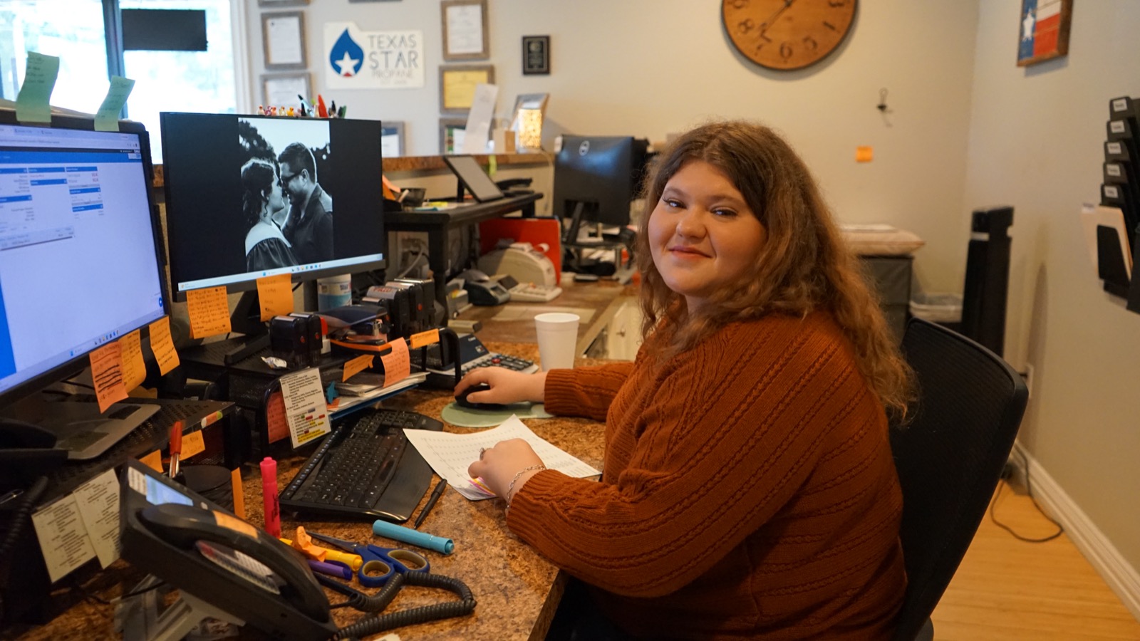 A Texas Star Propane team member at the front desk of the Huntsville office.
