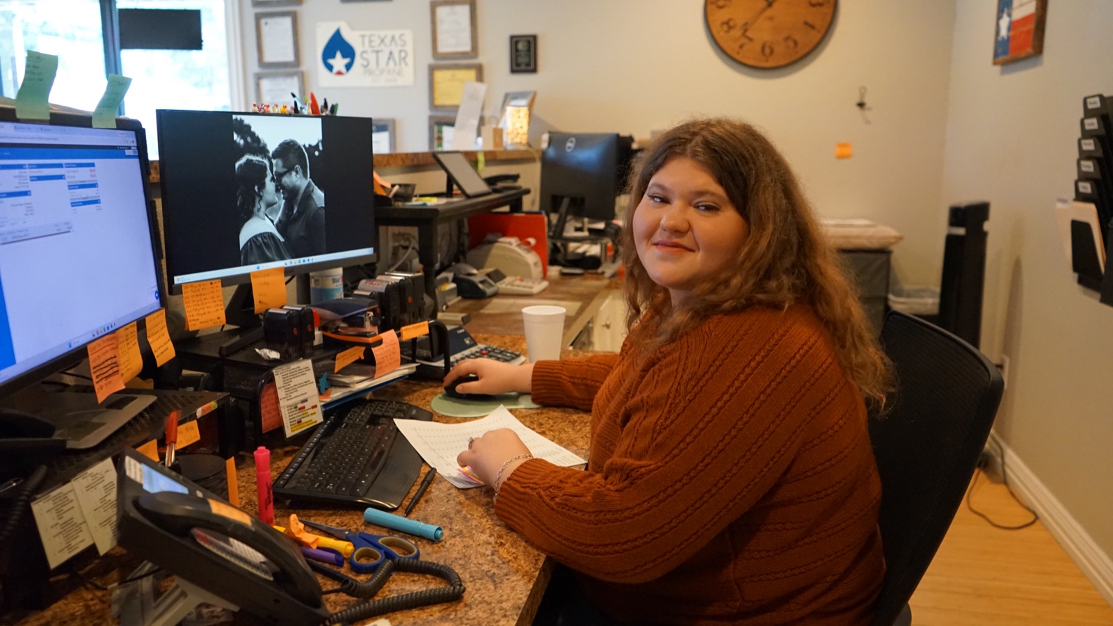 A Texas Star office team member at their desk.